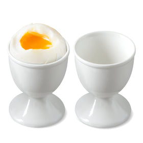 Cinf ceramic egg cups on table offer a stable, easy breakfast setup.