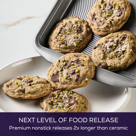 Circulon bakeware wide handles provide secure grip with mitts.