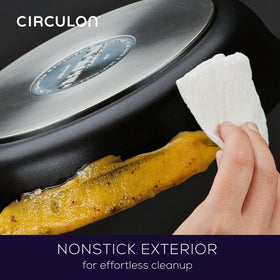 Rubberized stainless steel handle offers a comfortable, secure grip during cooking.