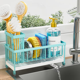 Cisily sponge holder with rotatable spout directing water to the sink, keeping counters dry.