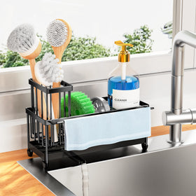 Cisily sponge holder with rotatable spout directs water to the sink.