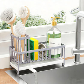 Cisily sponge holder with rotatable spout directing water to the sink for a dry countertop