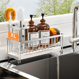 Cisily sponge holder with rotatable spout directs water into the sink, keeping counters dry.