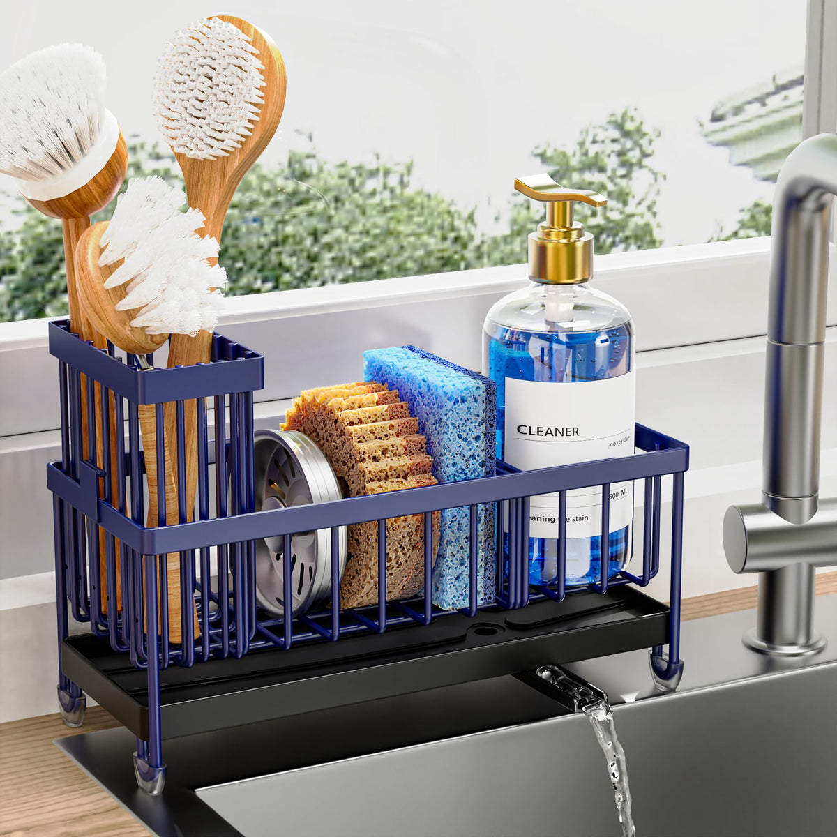 Cisily sponge holder with rotatable spout directing water to sink for dry countertops.
