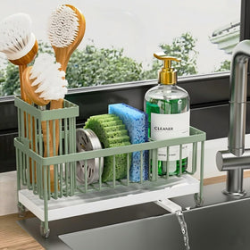 Cisily sponge holder with rotatable spout directing water to the sink.