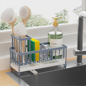 Cisily sponge holder with rotatable spout directs water into sink to keep counters dry