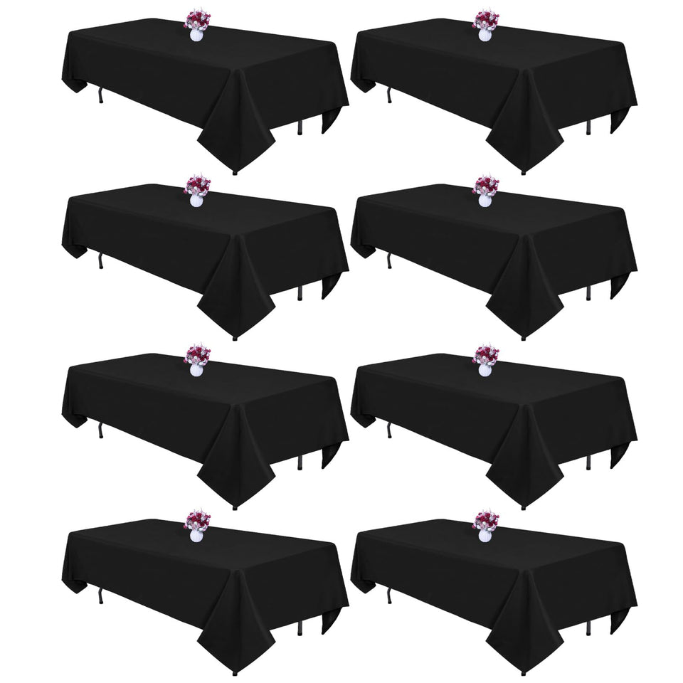 CKIKU black 8ft rectangle tablecloth covering a long dining table with a smooth, polished drape
