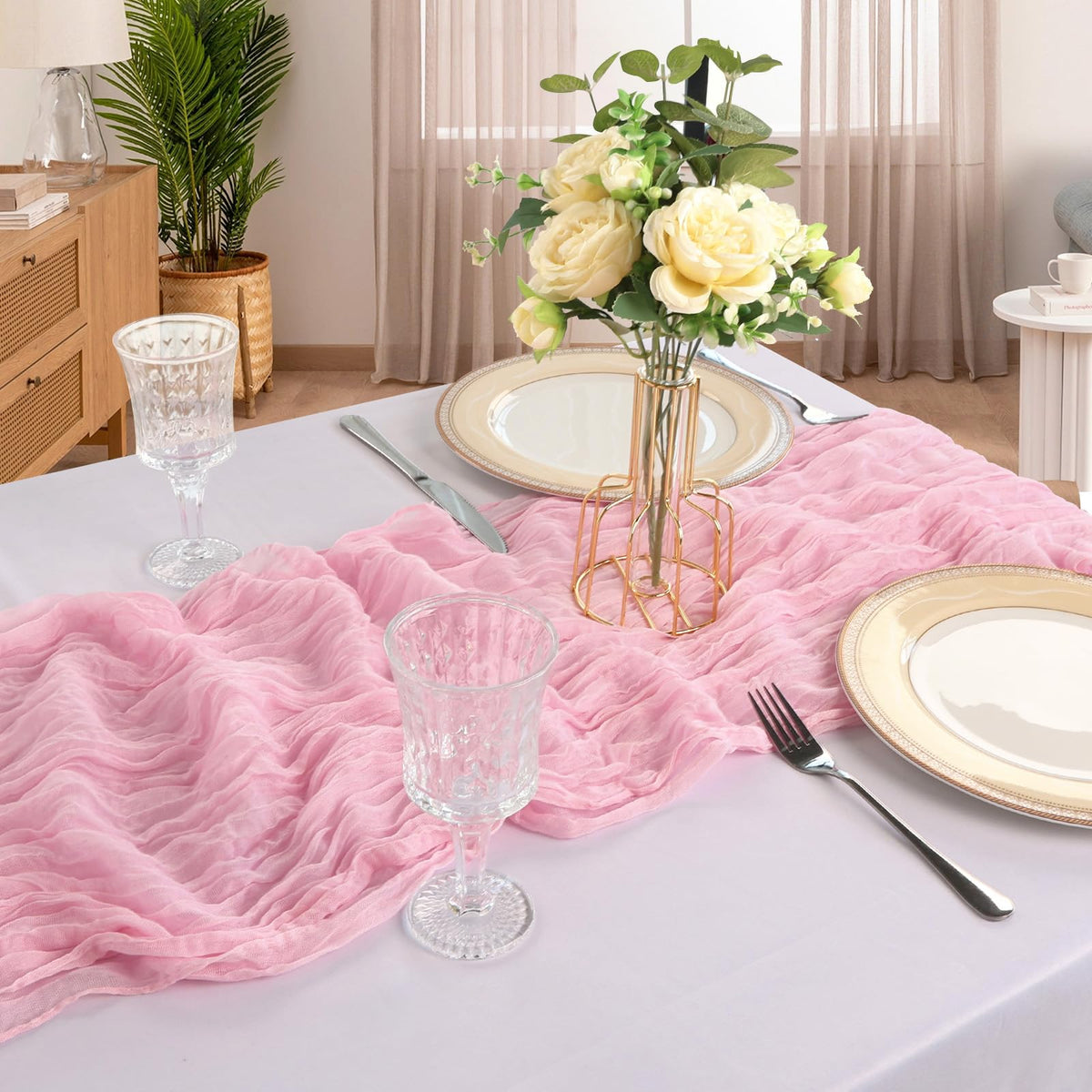 CKIKU easy-care table runner in pink is machine-washable for quick cleanup.