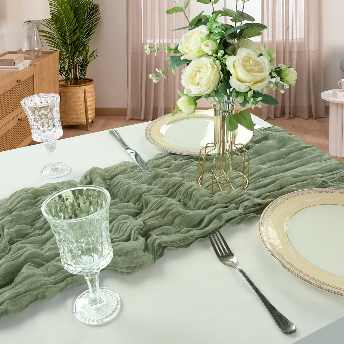 CKIKU holiday banquet setup using sage-green cheesecloth runner