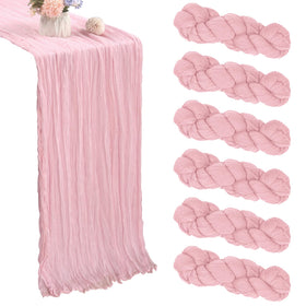 CKIKU pink cheesecloth table runner in a dining setup for festive gatherings