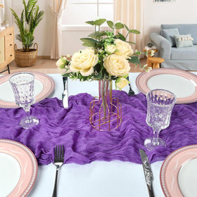 CKIKU boho purple table runner provides soft texture for centerpieces.