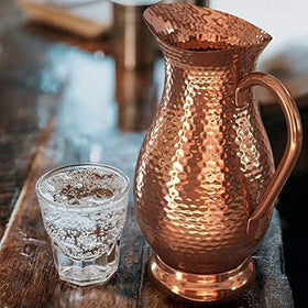 Classic Mules Pure Copper Pitcher used as a vase with fresh flowers