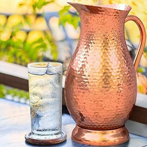 Classic Mules Pure Copper Pitcher pouring water showing elegant design and usability