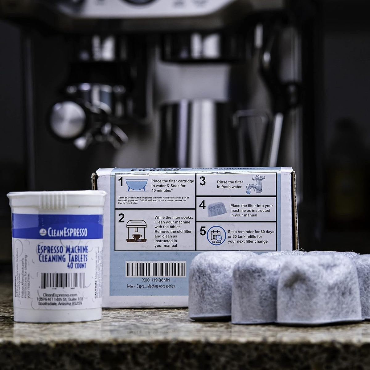 Tablets being added to a Breville machine for convenient cleaning.
