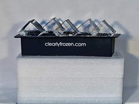 ClearlyFrozen ten-cubes ice tray releasing large glass-like ice cubes.
