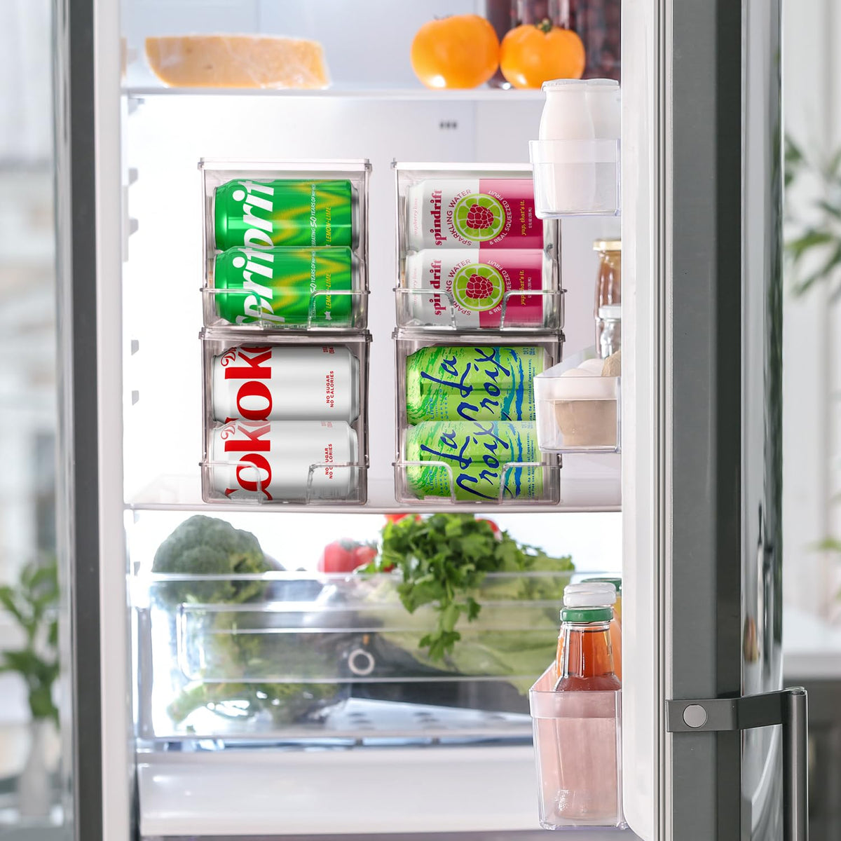 ClearSpace soda can organizer in action dispensing from the front saves fridge space.