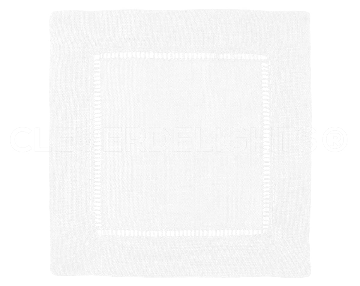 CleverDelights 12-pack napkins stacked, highlighting soft 100percent cotton durability for everyday use