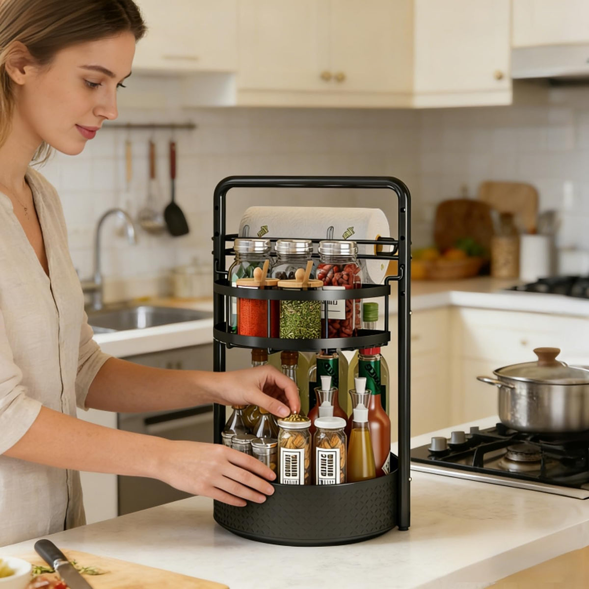 CLOKTA Rotating Spice Rack with built-in paper towel holder for quick cleanup.