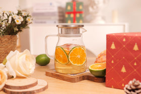 CNGLASS One-Touch Teapot on stovetop-ready glass for heating on gas burners