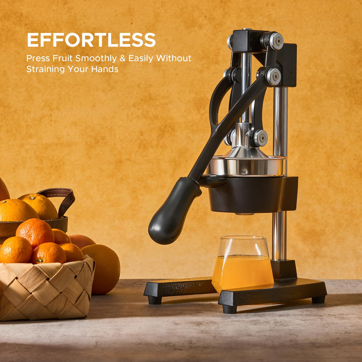 CO-Z manual citrus juicer pours fresh juice into glass with minimal effort.