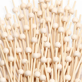 CockStixs bamboo cocktail picks for elegant garnish in appetizers and drinks.
