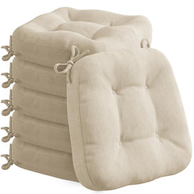 Codi six-pack beige dining chair cushions with non-slip bottom for stable seating.