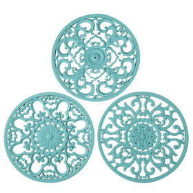 Colinda turquoise silicone trivet set with three designs protects surfaces from hot dishes.