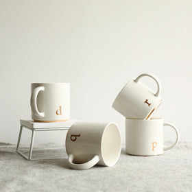 COLLECTIVE HOME dishwasher-safe, gold-etched lettering stays vibrant after washing.