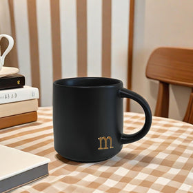 COLLECTIVE HOME dishwasher-safe mug with gold lettering