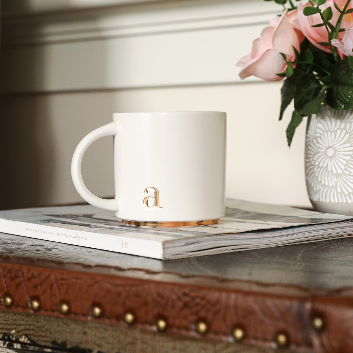 COLLECTIVE HOME Gold accent mug highlights initials for an elegant desk accent.