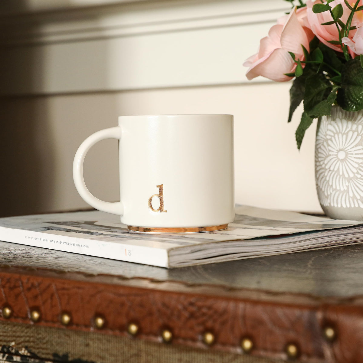 COLLECTIVE HOME gold-plated alphabet design adds elegant flair to mornings.