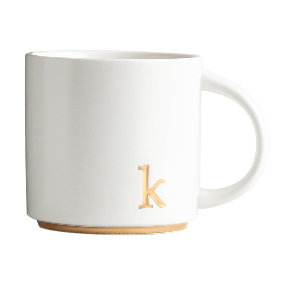 COLLECTIVE HOME monogram ceramic mug showing 15oz capacity for generous hot beverages.