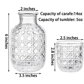 Coloch carafe pattern closeup highlights intricate decorative carving on clear glass.