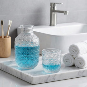 Coloch clear glass carafe for stylish hydration and versatile serving.