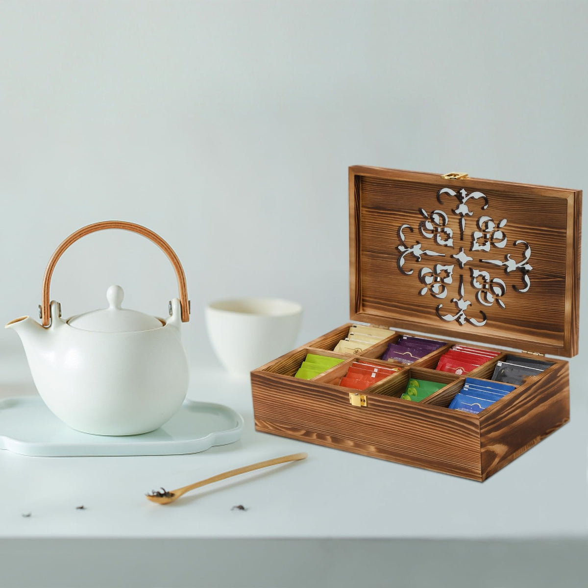 Coloch tea storage on a countertop within easy reach