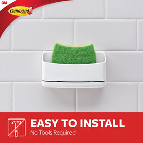 Close-up of damage-free strips on Command sponge caddy.