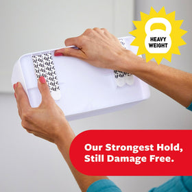 Command heavyweight damage-free hanging caddy holds up to 10 lbs securely.