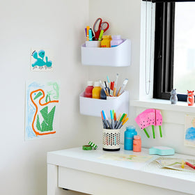 Command Organizing Caddy facilitates easy rehanging without leaving holes.