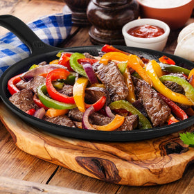 Commercial CHEF outdoor-ready skillet designed for campfires with steady heat retention.