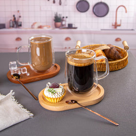 COMOME two-mug set with spoons supports shared morning rituals.
