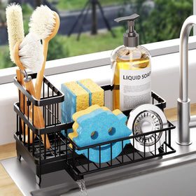 Consumest sponge holder with rotatable spout drains water into the sink, keeping counters dry.