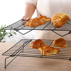 Coobbar stackable cooling rack with adjustable legs for compact storage.