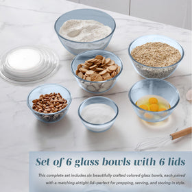COOK WITH COLOR glass bowls ready for salads and sides with secure lids.