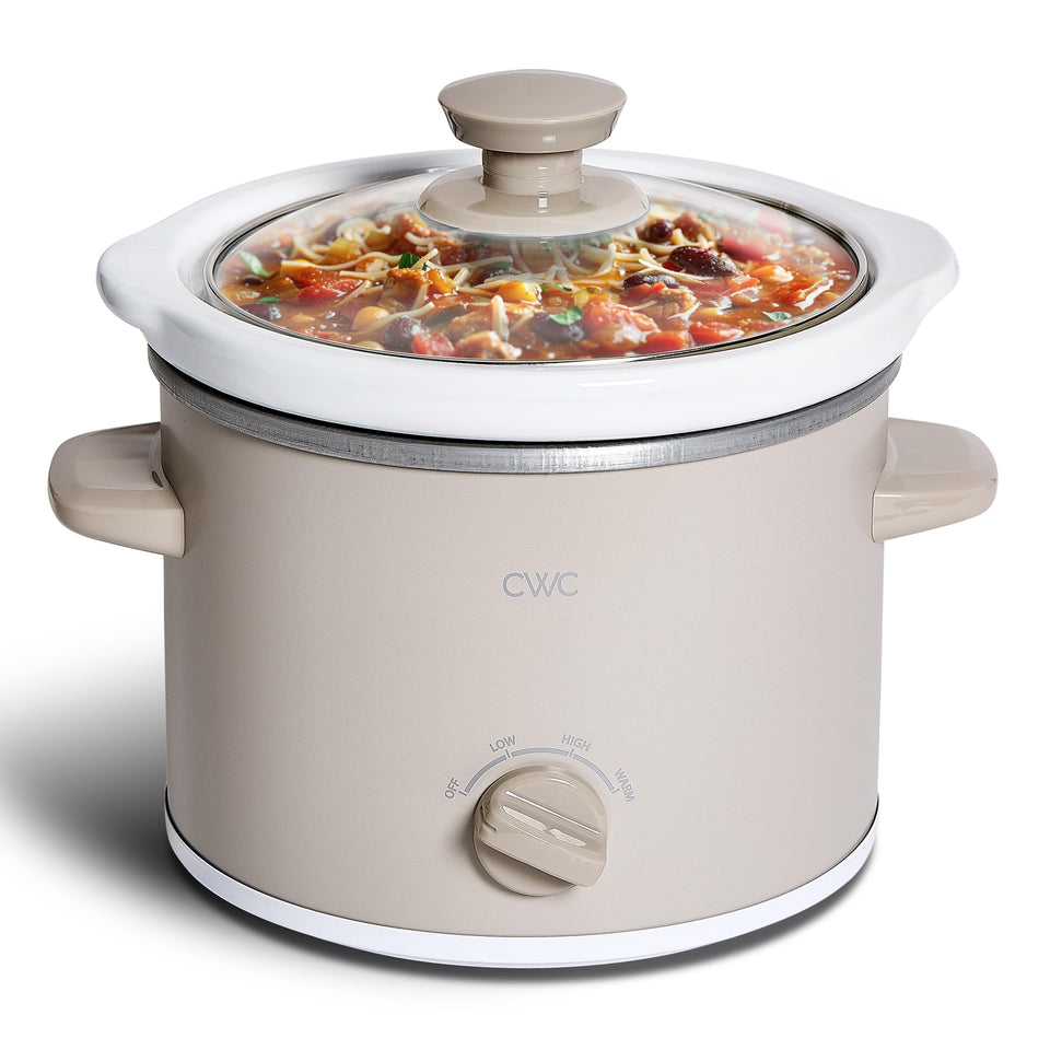 COOK WITH COLOR 2QT mini slow cooker on counter showcases compact design for small meals.