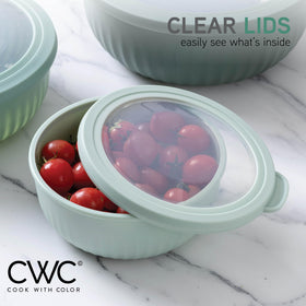 Nest for easy storage: Cook with Color bowls with lids.