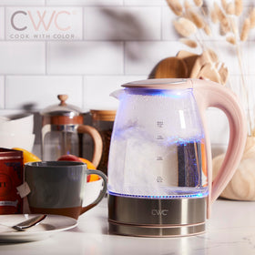 COOK WITH COLOR electric tea kettle on countertop with cord storage for tidy space.