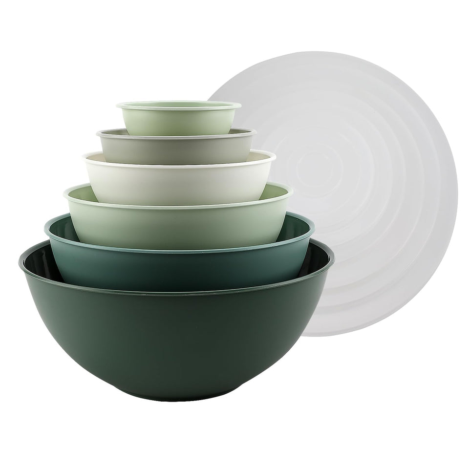 Cook With Color sage mixing bowls stacked for compact storage.