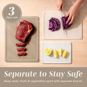 Cook with Color rubber-border non-slip edge cutting board in action.