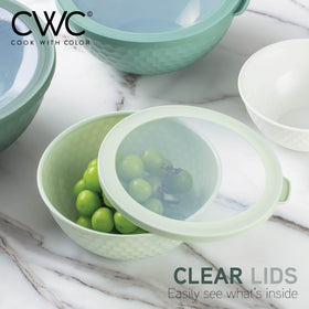 COOK WITH COLOR sage embossed detail enhances modern kitchen aesthetics