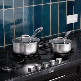 COOKER KING stay-cool handle provides a comfortable grip while cooking.